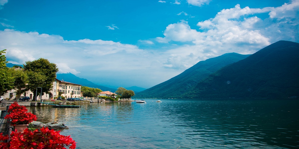 Book a taxi from Milano to Lugano.