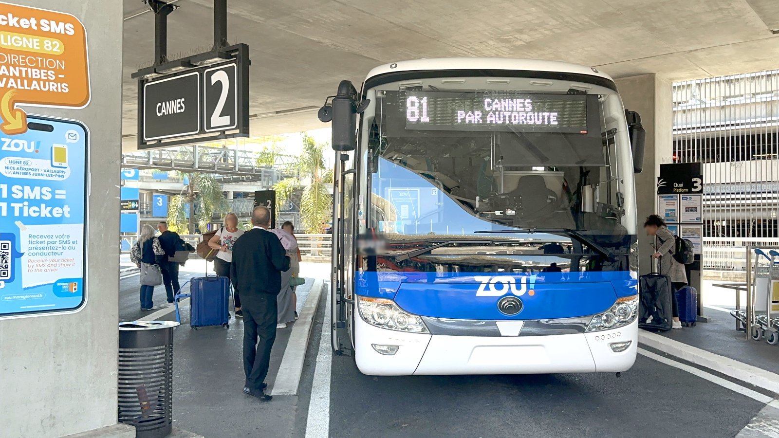 The bus departs from a stop at Nice Airport to Cannes.