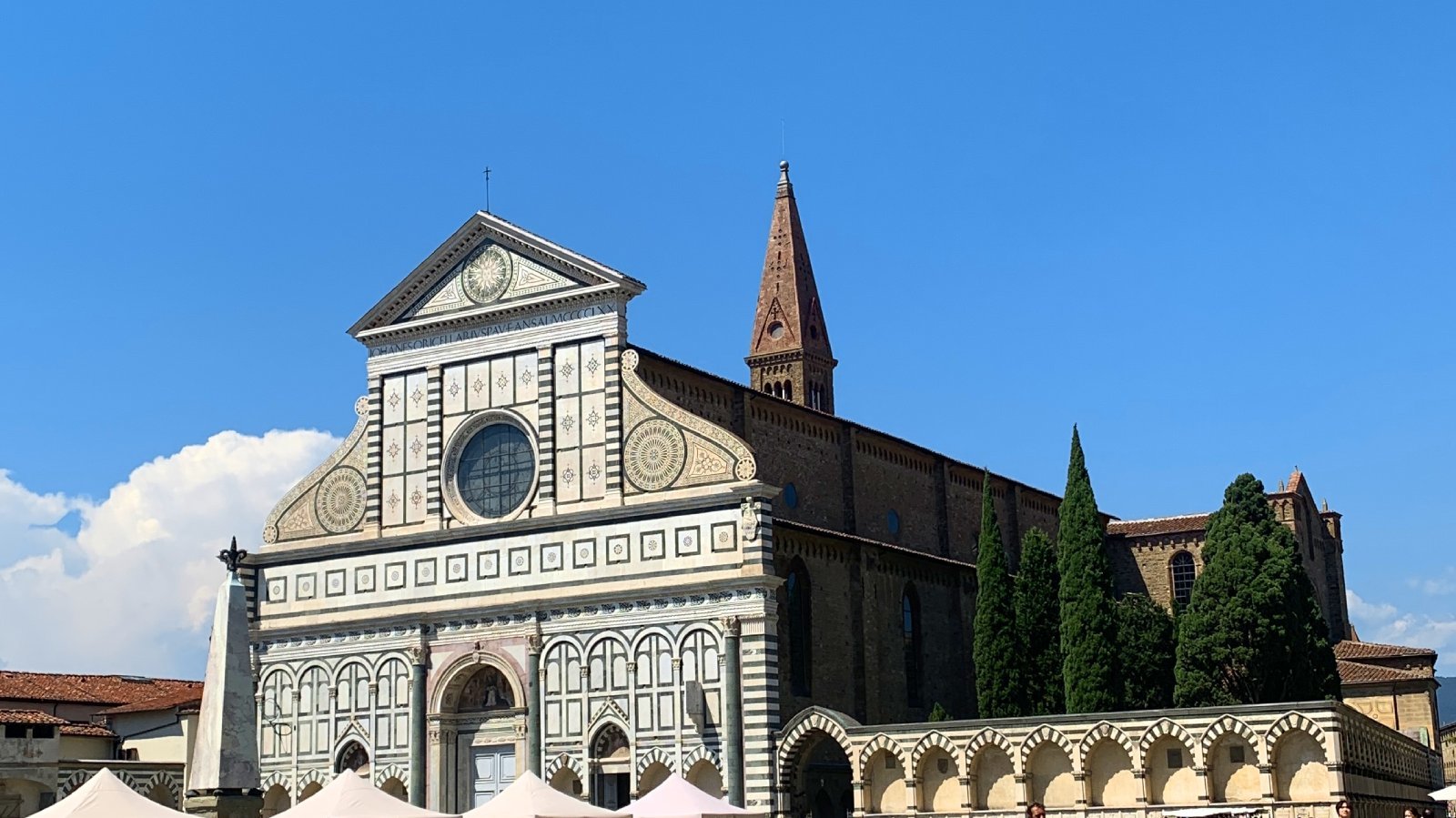 Florence in northern Italy with mountains and waterfront buildings