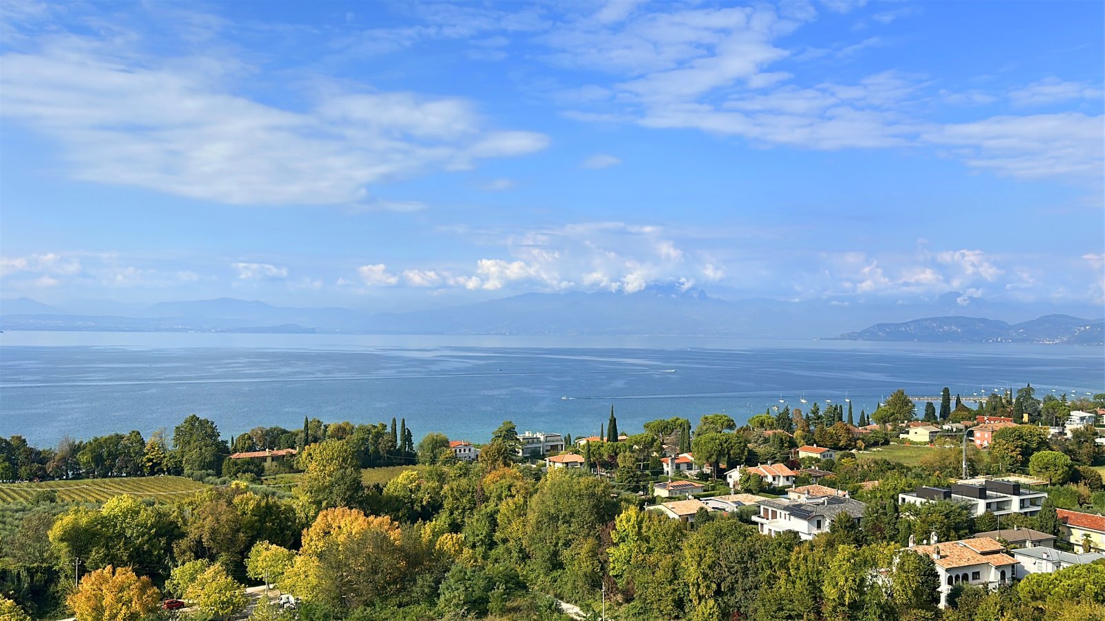 Garda in northern Italy with mountains and waterfront buildings