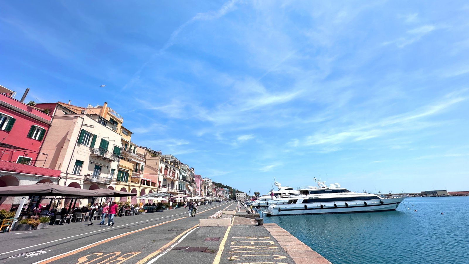 Imperia in northern Italy with mountains and waterfront buildings