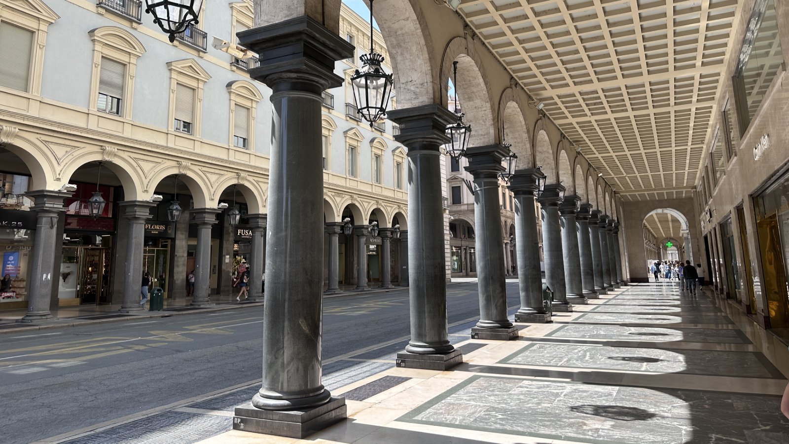 Turin in northern Italy with mountains and waterfront buildings