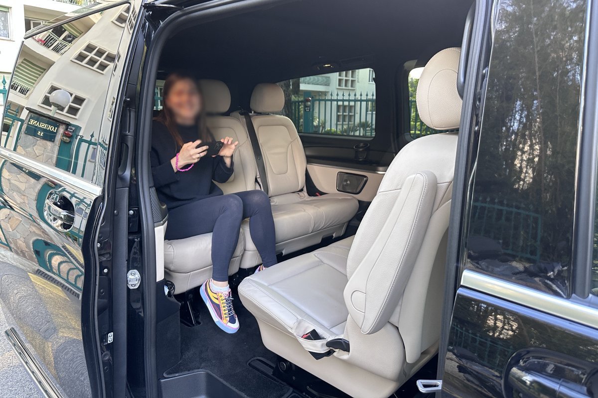 Passenger sitting inside a car during a private transfer