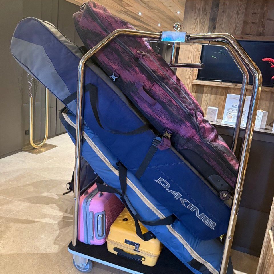 Photo of clients' luggage and skis sent to the driver to check whether everything will fit in the vehicle