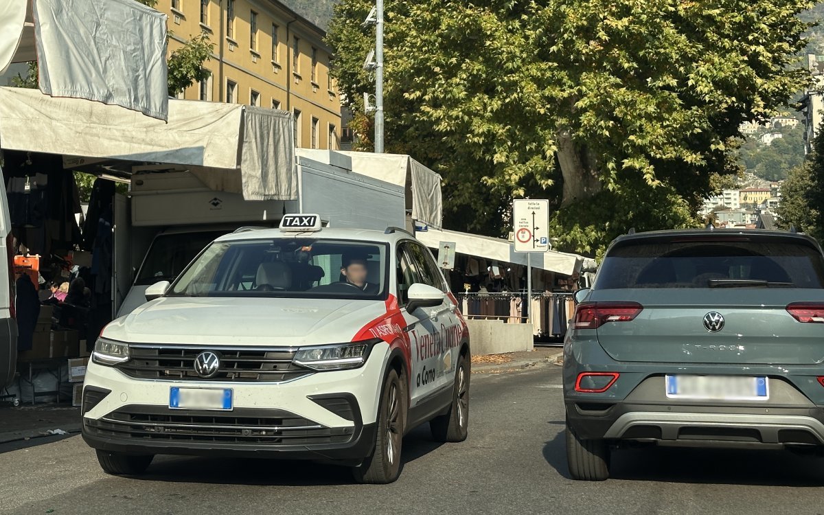 Official taxi car waiting for passengers in Como, Italy