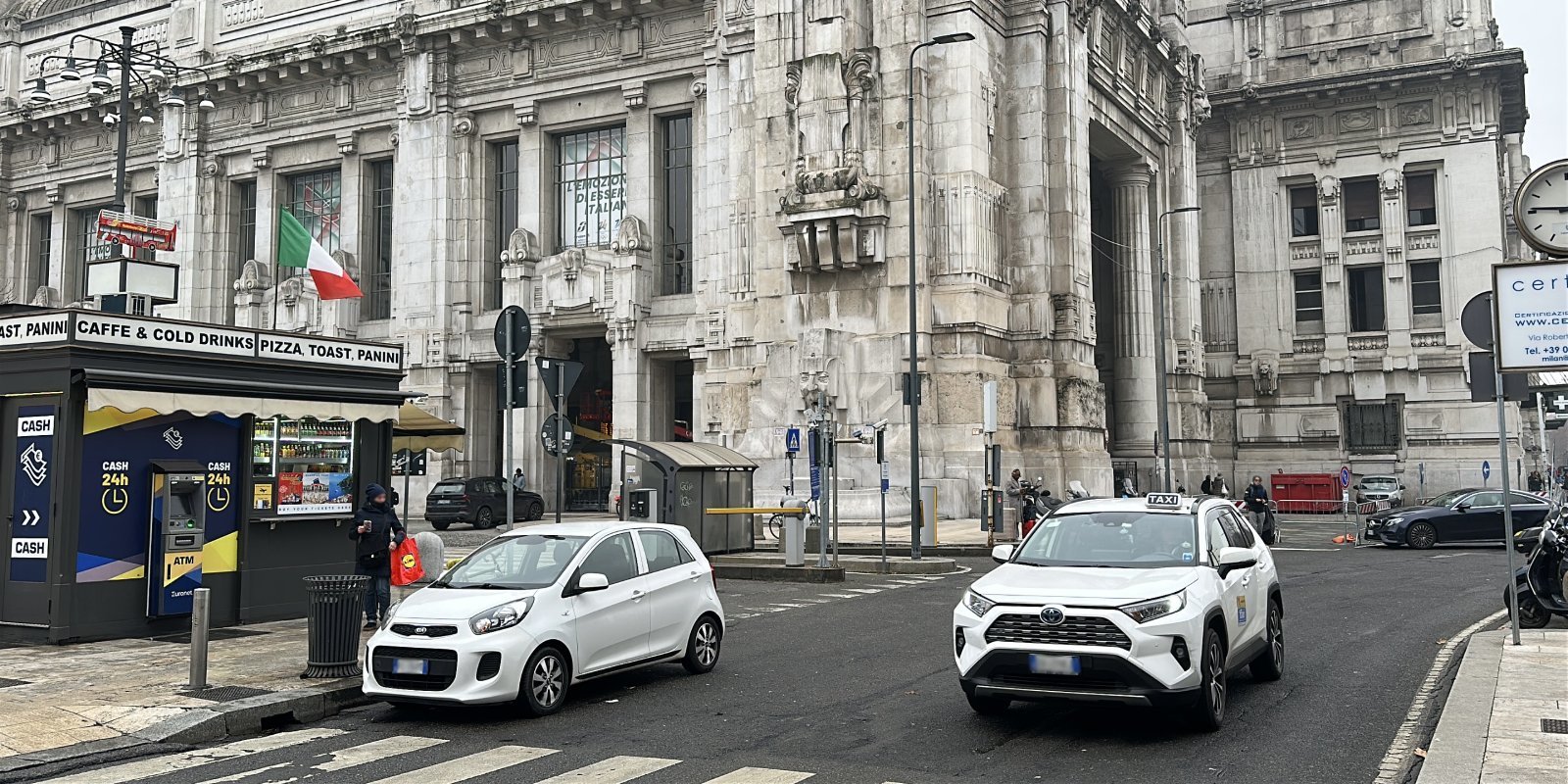 Official taxi car waiting for passengers in Genoa, Italy