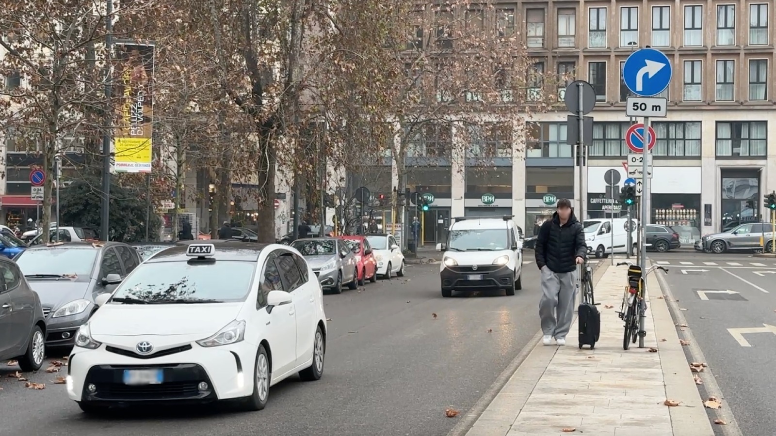 Official taxi car waiting for passengers in Imperia, Italy