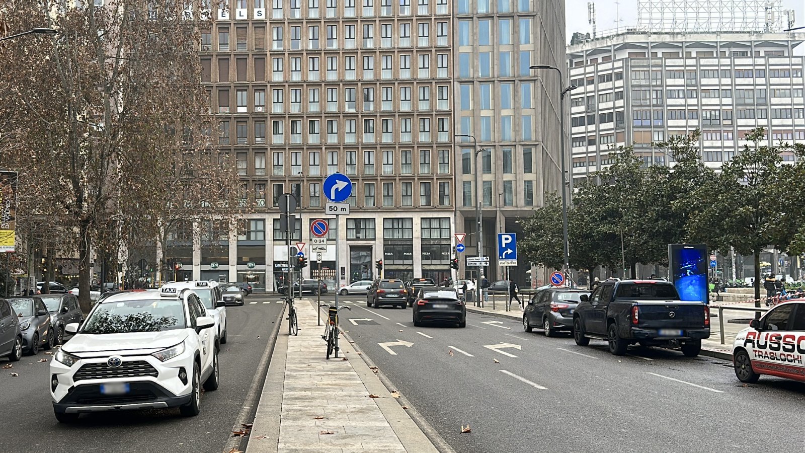 Official taxi car waiting for passengers in Lecco, Italy
