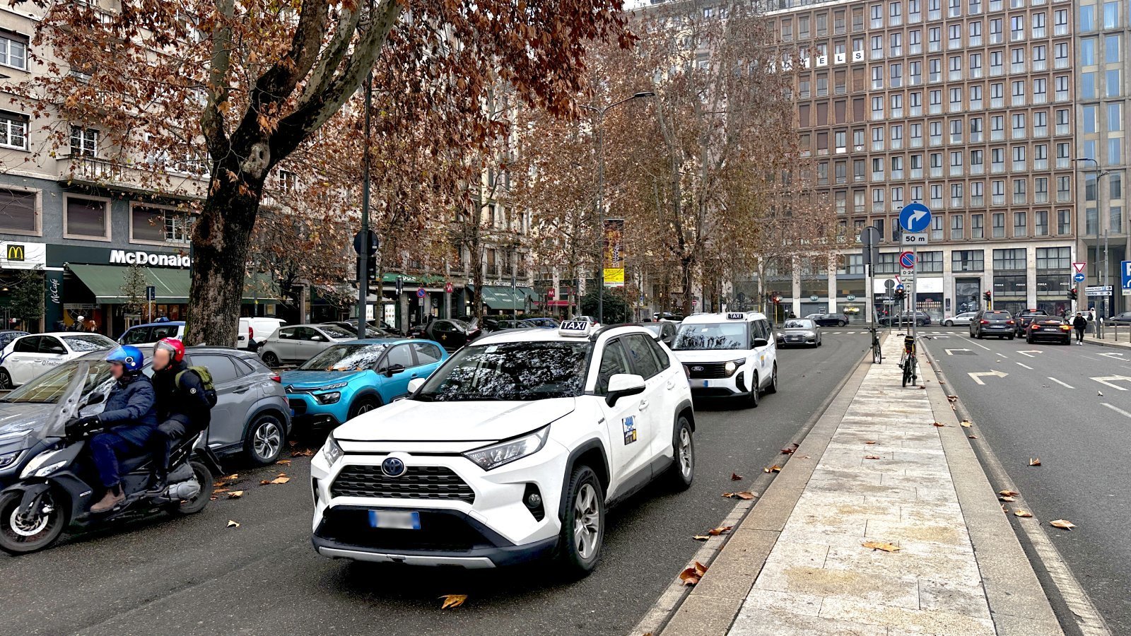 Official taxi car waiting for passengers in Monza, Italy