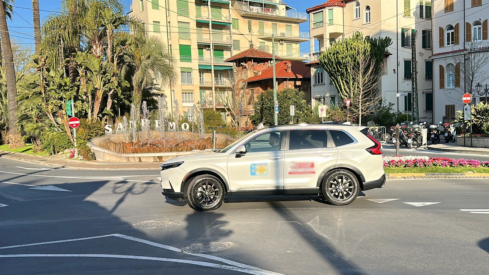 Official taxi car waiting for passengers in San Remo (Sanremo), Italy