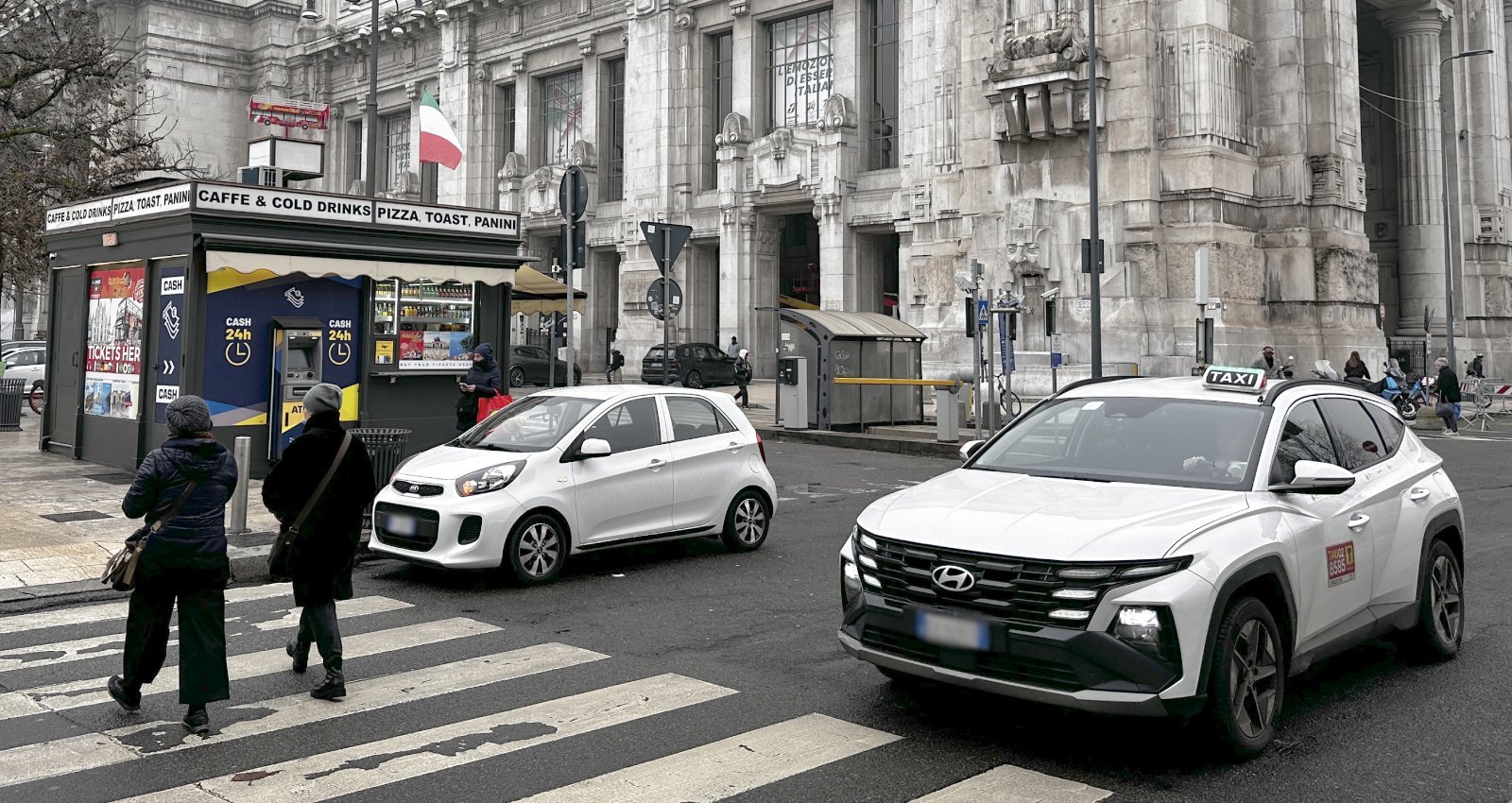 Official taxi car waiting for passengers in Turin, Italy