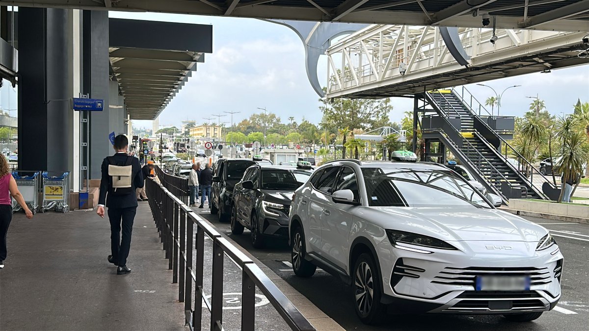 Official taxis waiting for passengers at Nice Airport for transfers to Le Lavandou