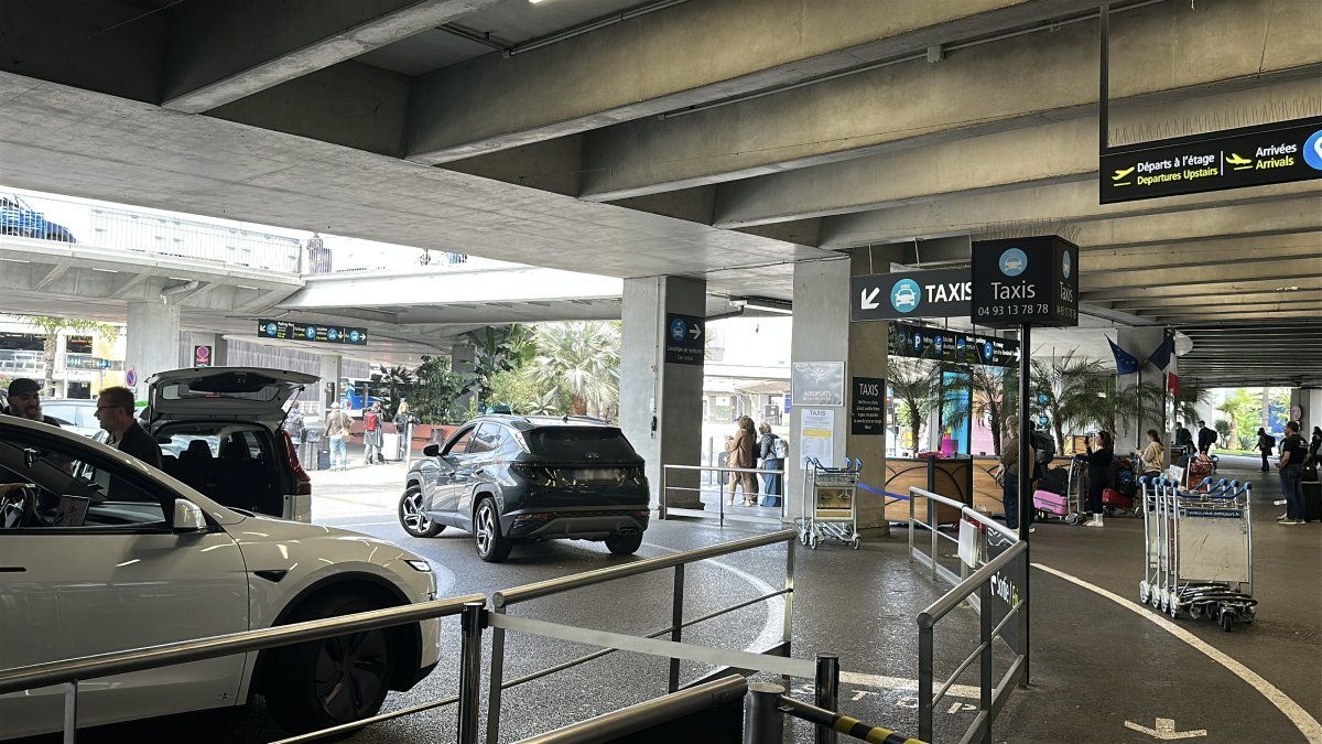 Official taxis waiting for passengers at Nice Airport for transfers to Ramatuelle