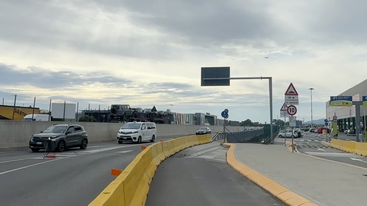 Official taxi waits for passengers to take them from Bergamo Airport to Madonna di Campiglio