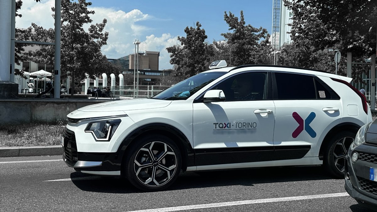 Official taxi waits for passengers to take them from Turin Airport to Cervinia