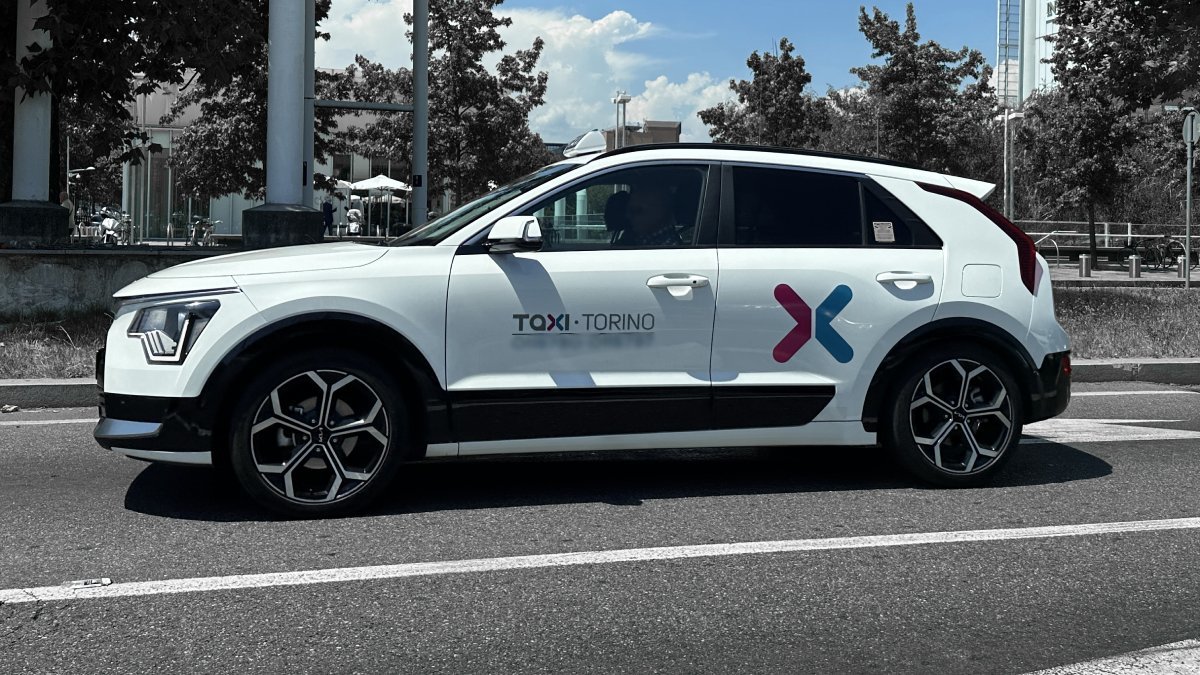 Official taxi waits for passengers to take them from Turin Airport to Sauze d'Oulx