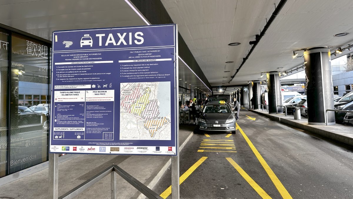 Official taxi is waiting for passengers to take them from Geneva airport to Belle Plagne