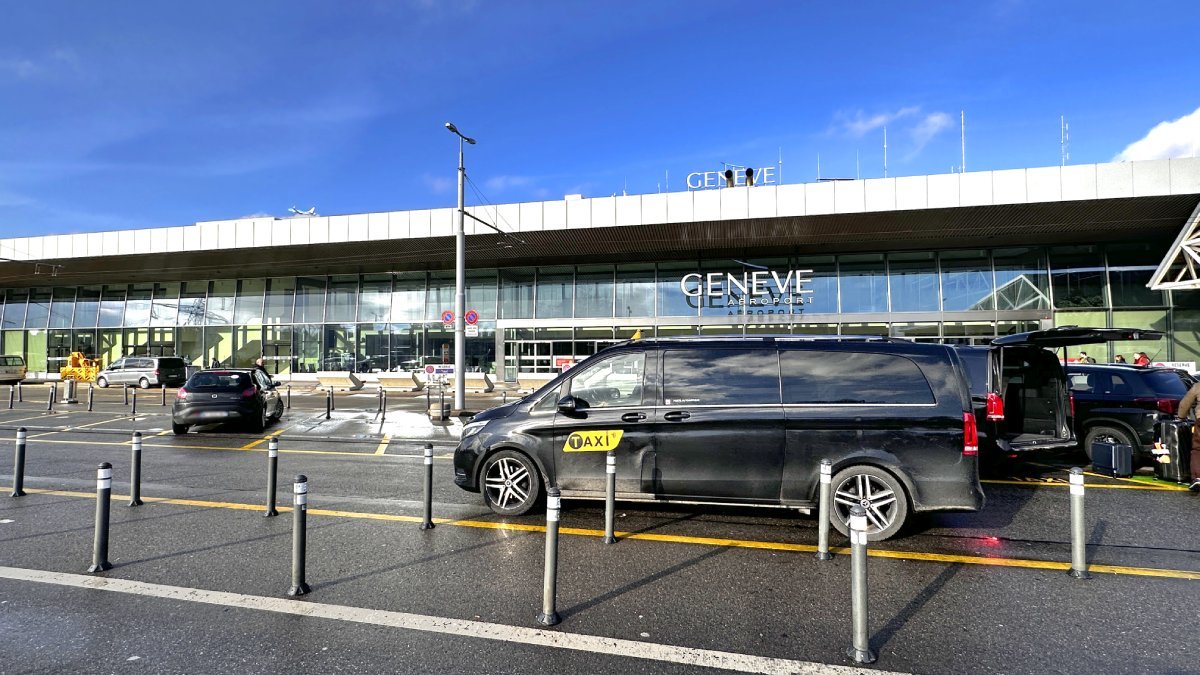 Official taxis waiting for passengers to take them from Geneva airport to Villars-sur-Ollon