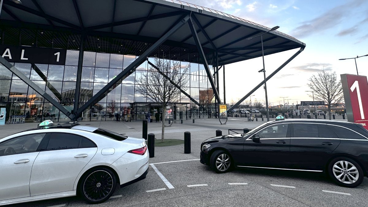 Official taxi waiting for passengers to take them from Lyon Airport to La Plagne