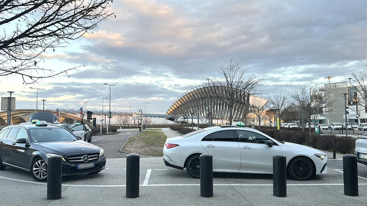 Official taxi waiting for passengers to take them from Lyon Airport to Meribel