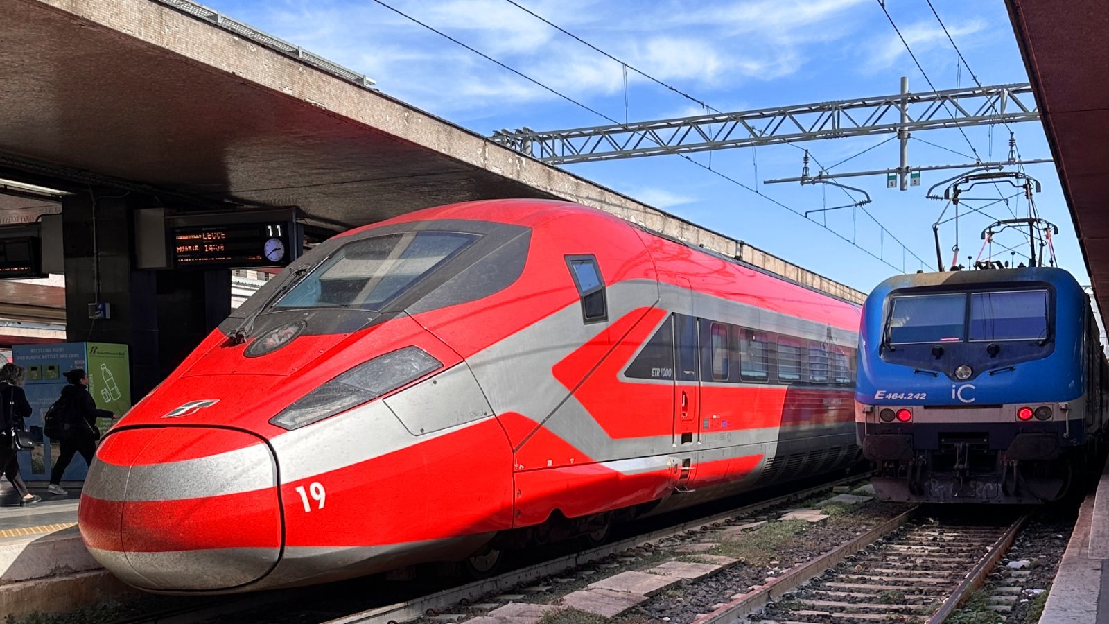 A train waits for passengers at Roma Termini station in Italy.