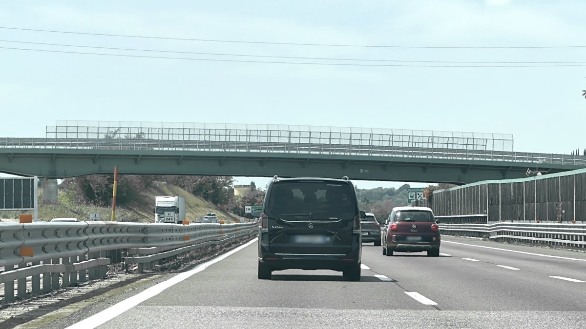 Car performs a transfer on the road from Linate Airport to Madonna di Campiglio