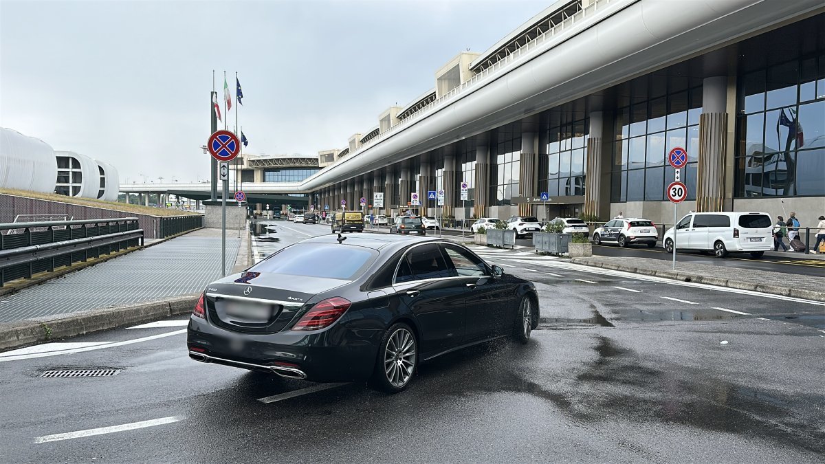 Car performs a transfer on the road from Malpensa Airport to Zermatt (Täsch)