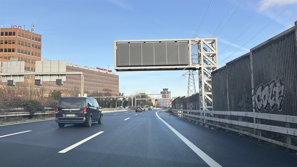 Car making a transfer along the road from Geneva airport to Morges (main route)