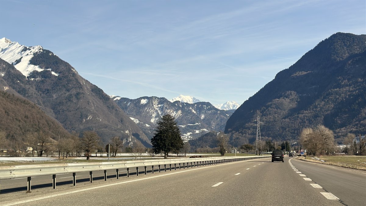 Car making a transfer on the road from Geneva airport to Belle Plagne (main route)