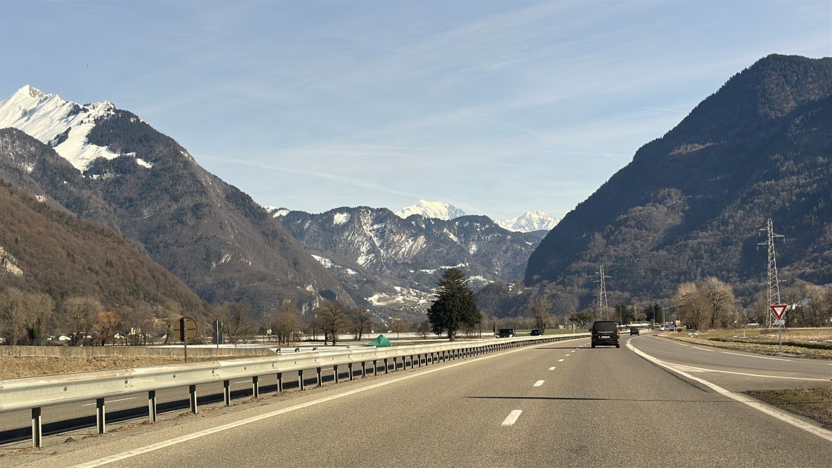Car making a transfer on the road from Geneva airport to Chamonix (main route)