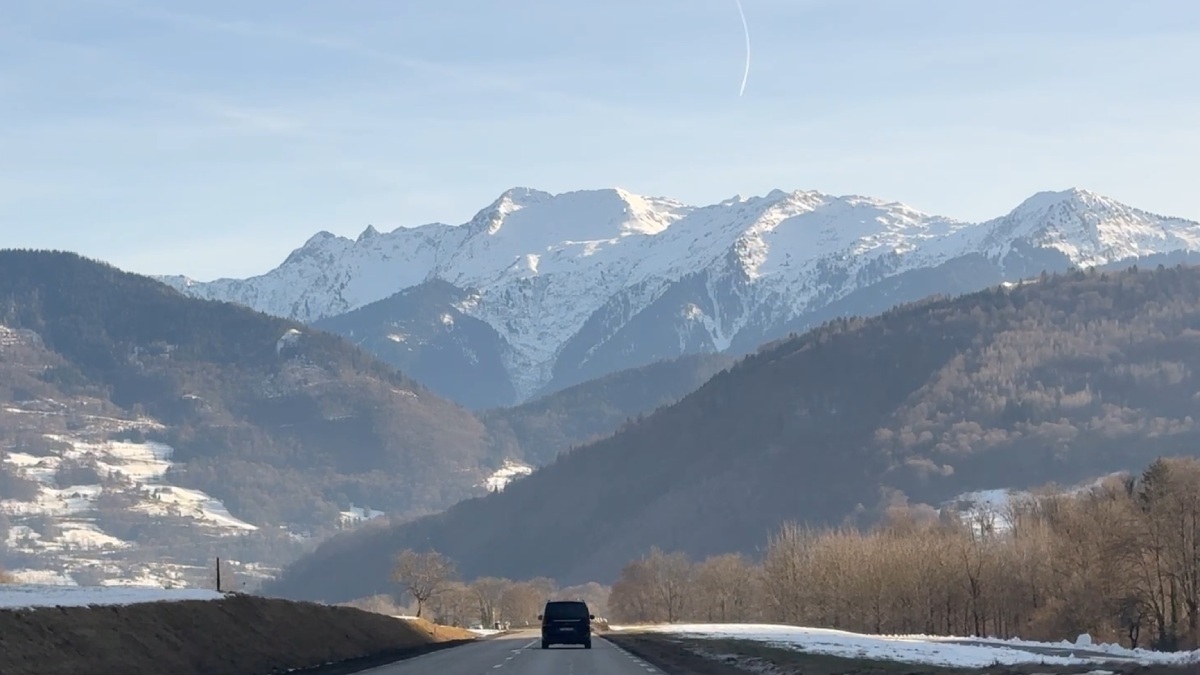 Car making a transfer on the road from Geneva airport to Morzine (main route)
