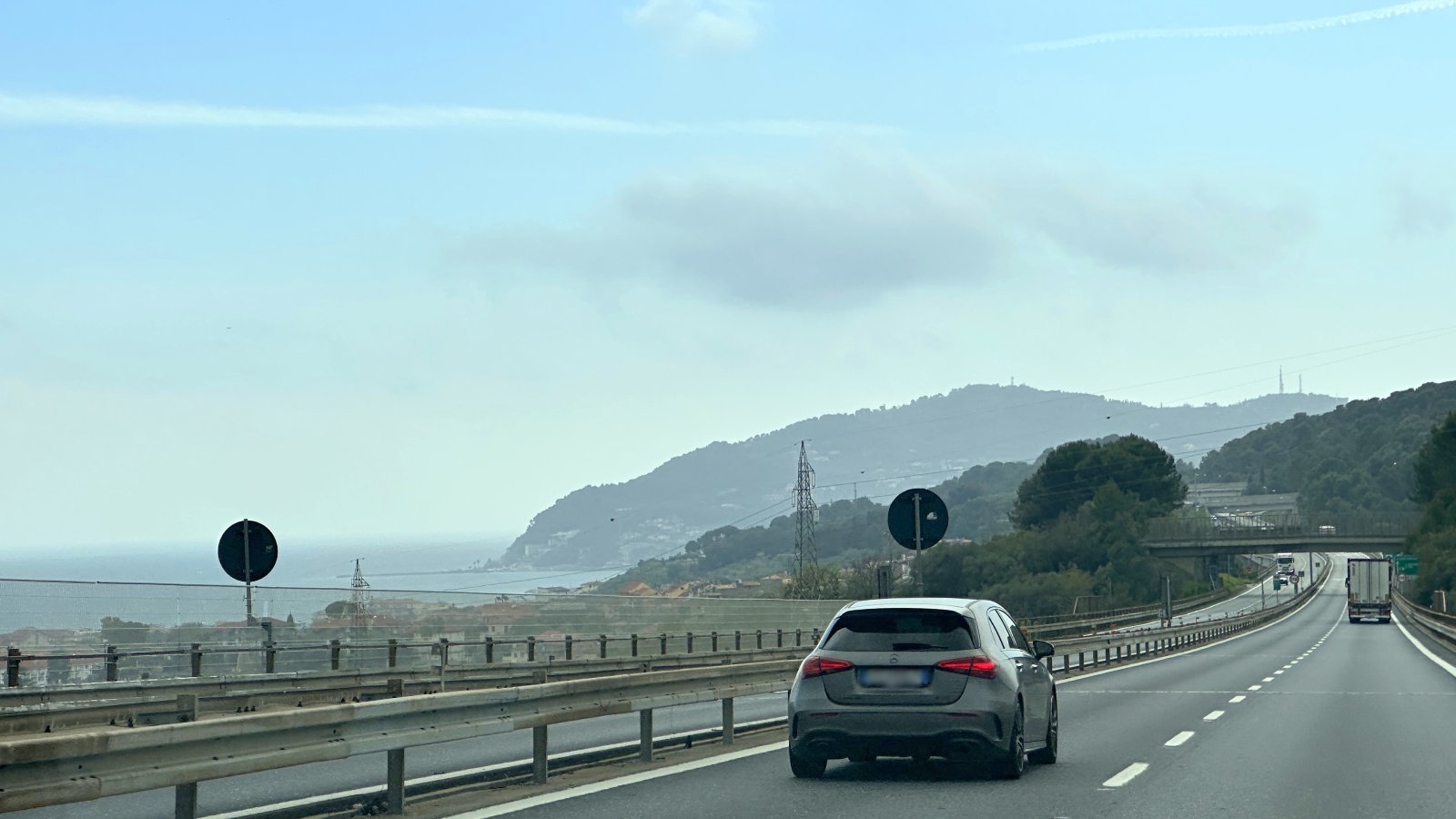 Mercedes driving from Milan to Alassio on highway