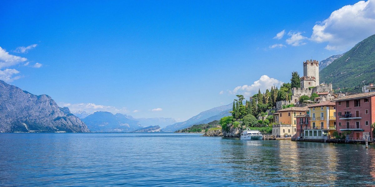 Book a private transfer from Milan airport Malpensa to Garda