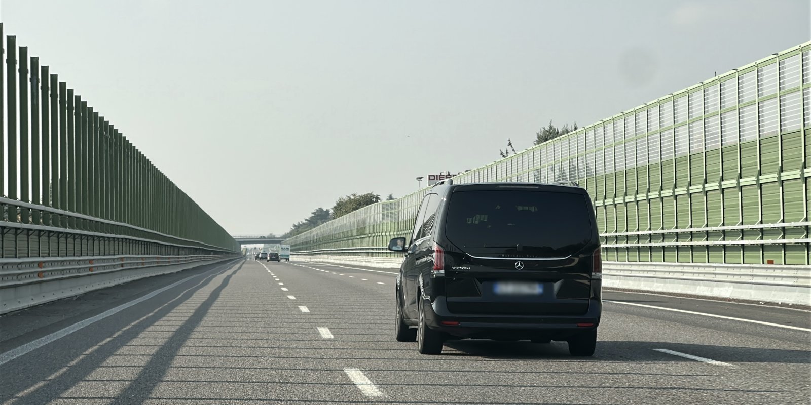 Mercedes driving from Milan to Menaggio on highway