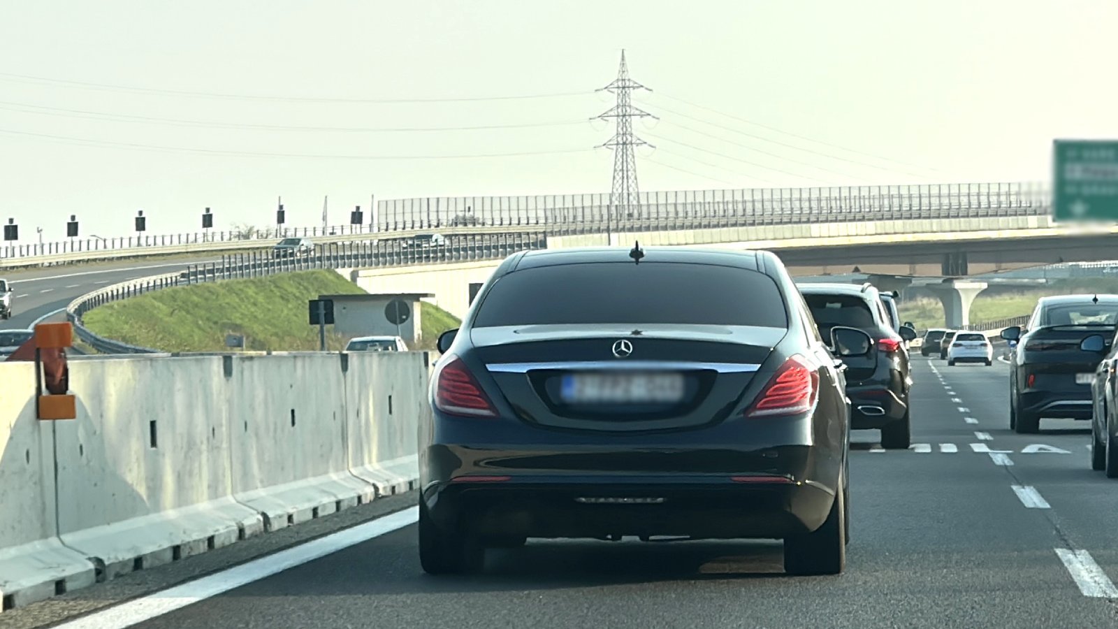 Mercedes driving from Milan to Pisa on highway
